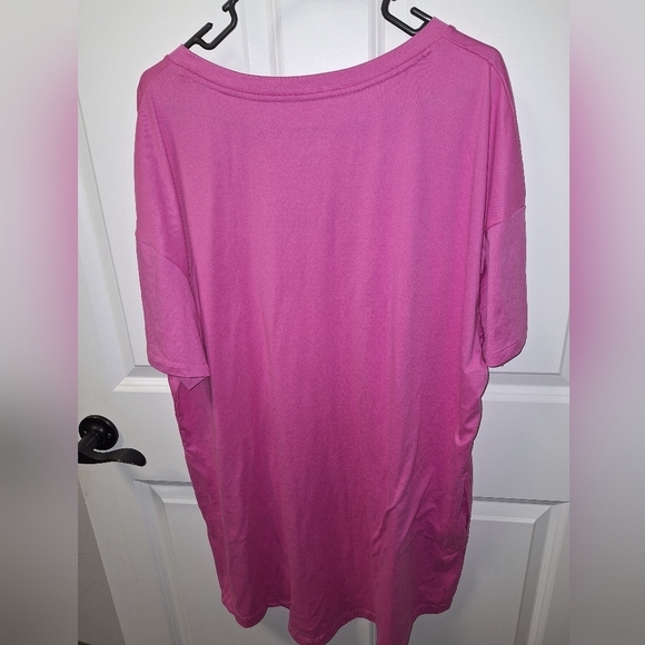 A Secret Treasures pink sleep shirt in a size L/XL with 2 pockets on front. - Picture 2 of 5